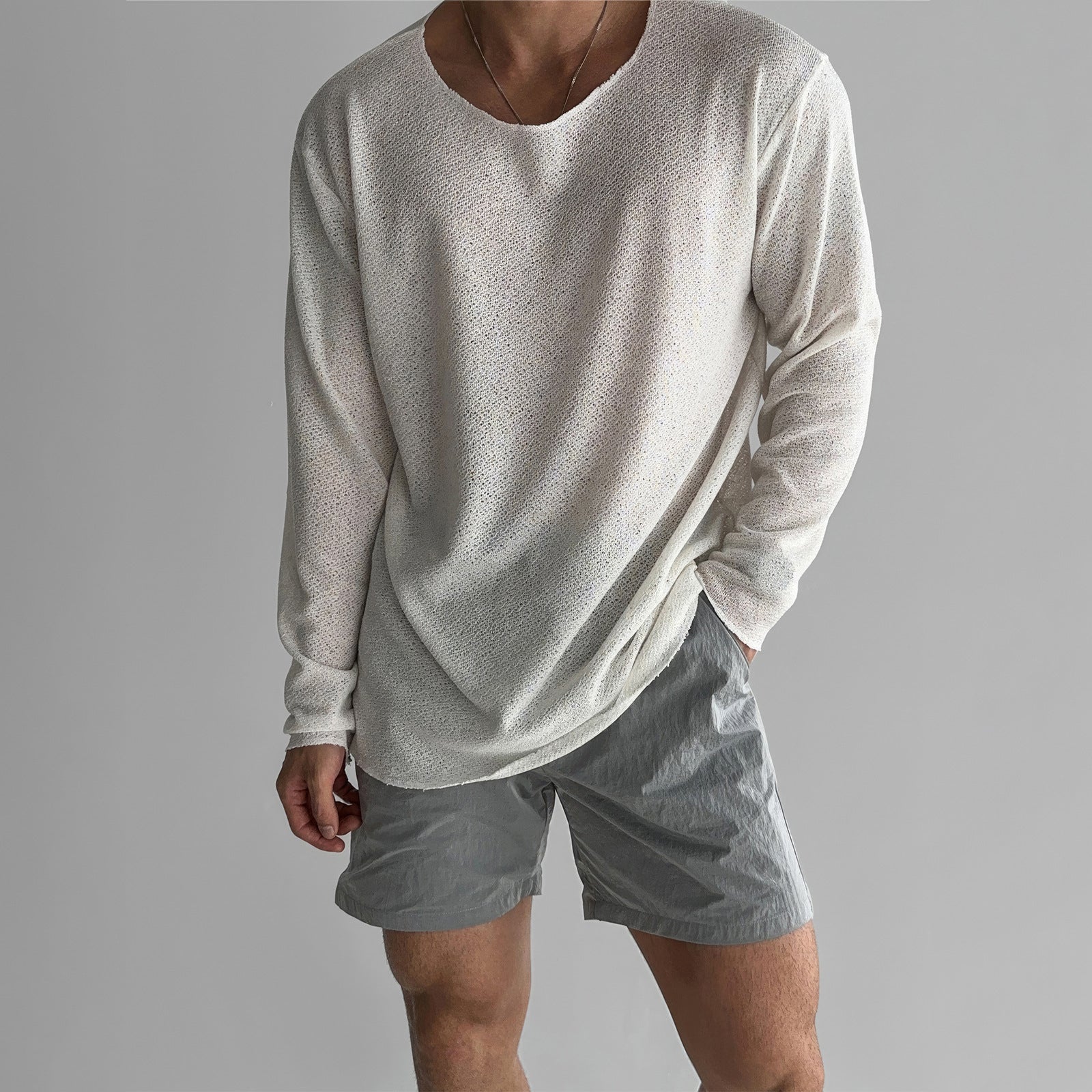 Men's white relaxed fit breathable knit shirt with long sleeves