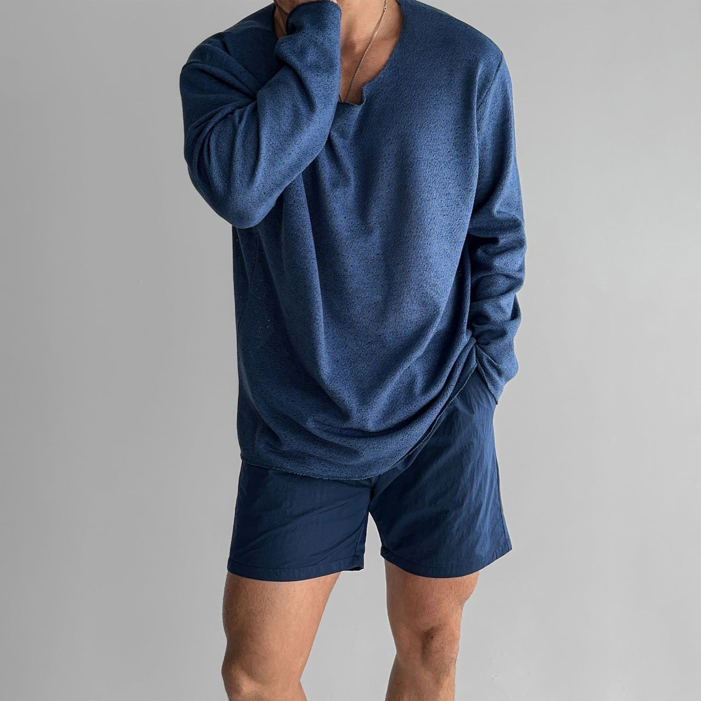 Men's white relaxed fit breathable knit shirt with long sleeves