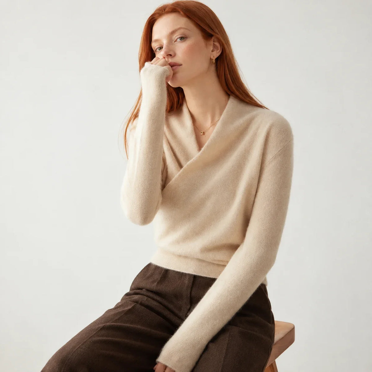 Women's beige cashmere wrap sweater with crossover collar