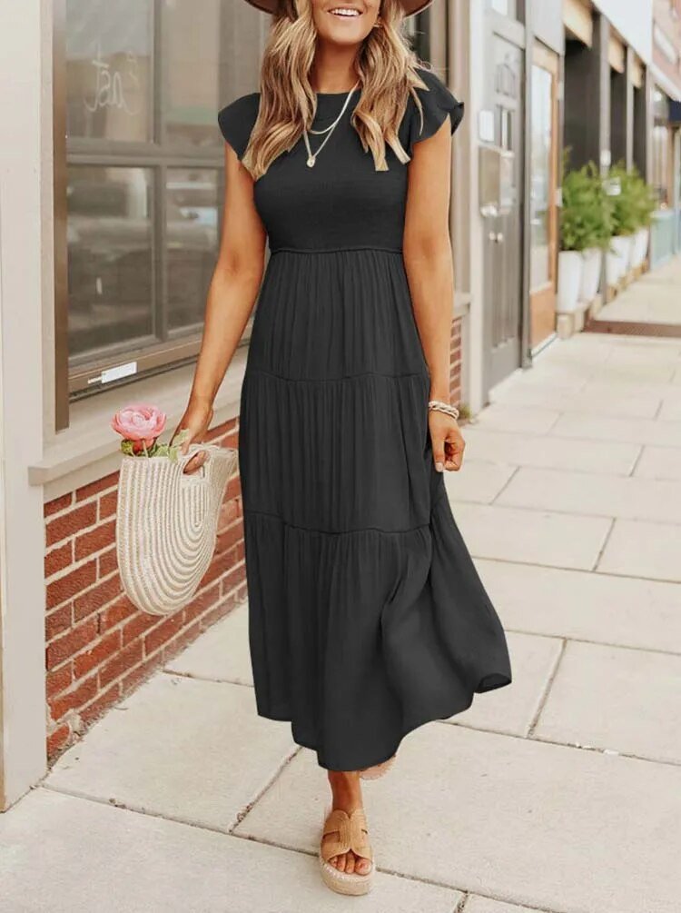 Women's orange tiered maxi dress with cap sleeves