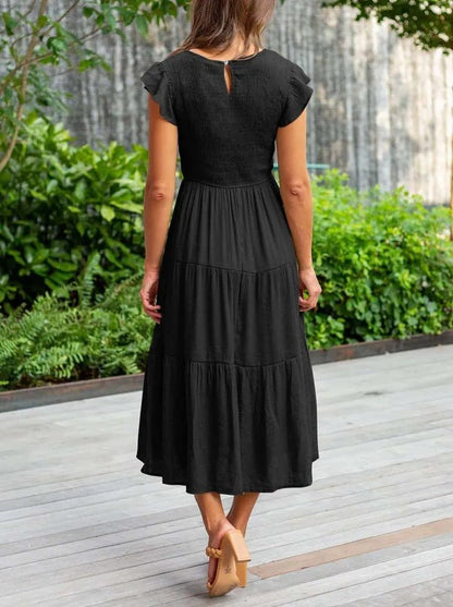 Women's orange tiered maxi dress with cap sleeves