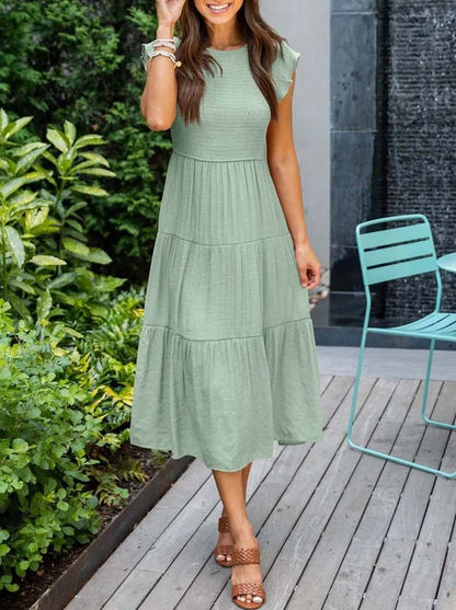Women's orange tiered maxi dress with cap sleeves