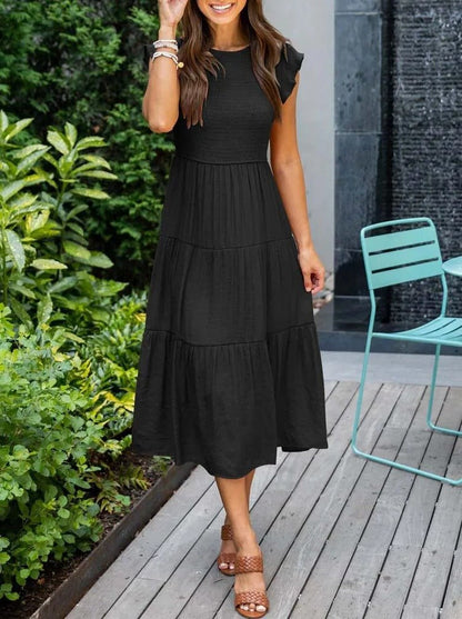 Women's white tiered maxi dress with cap sleeves