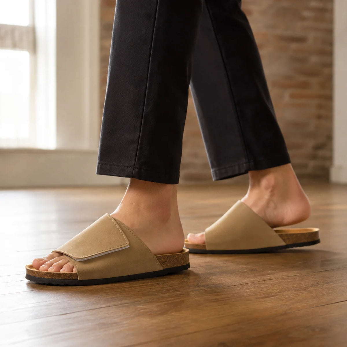 Women's brown leather sandals with adjustable Velcro strap