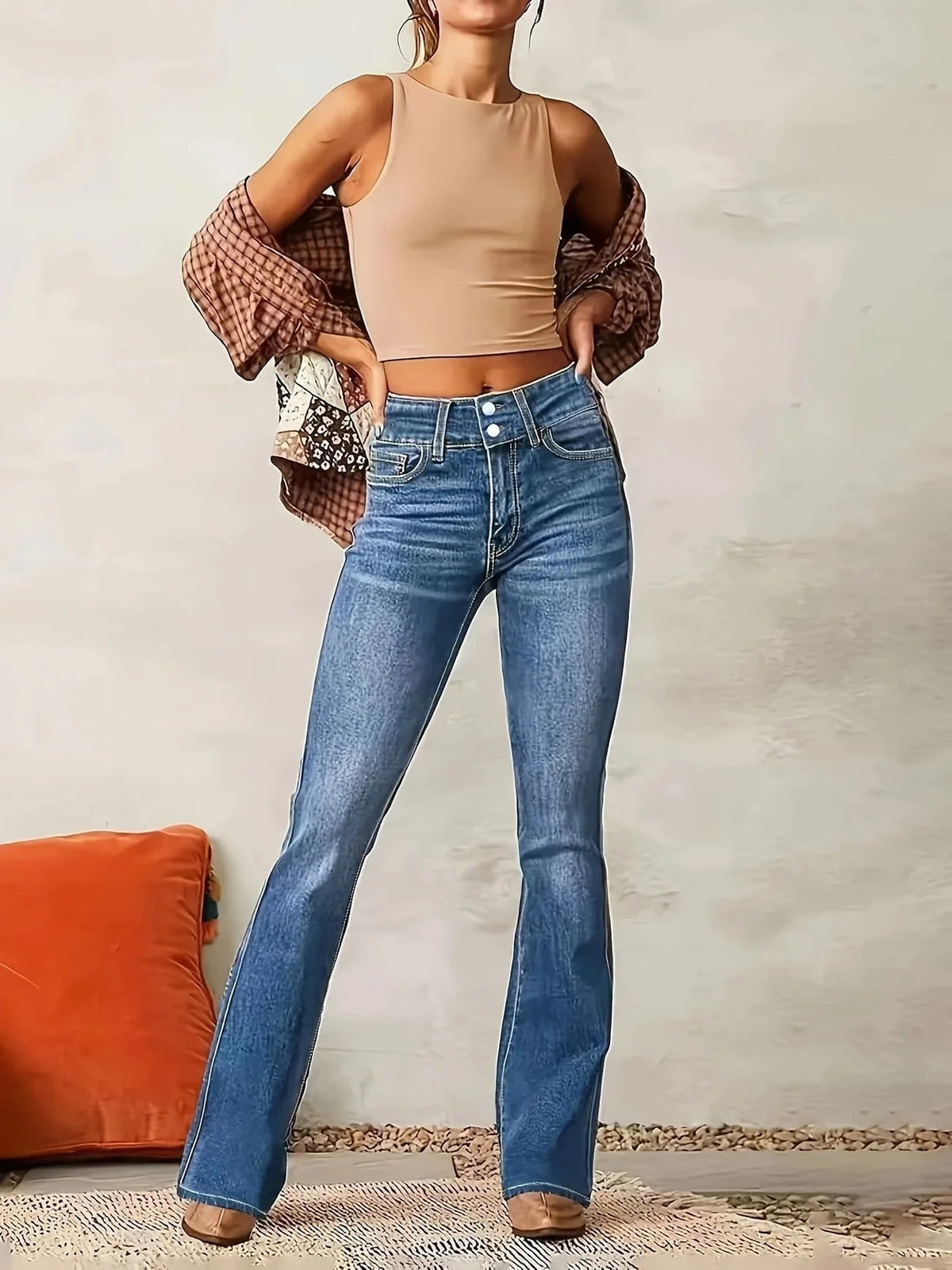 Women's blue high-rise flare jeans in structured denim