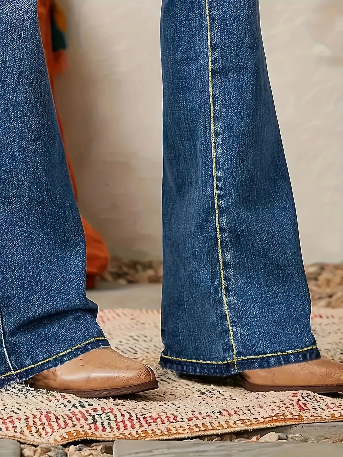 Women's blue high-rise flare jeans in structured denim