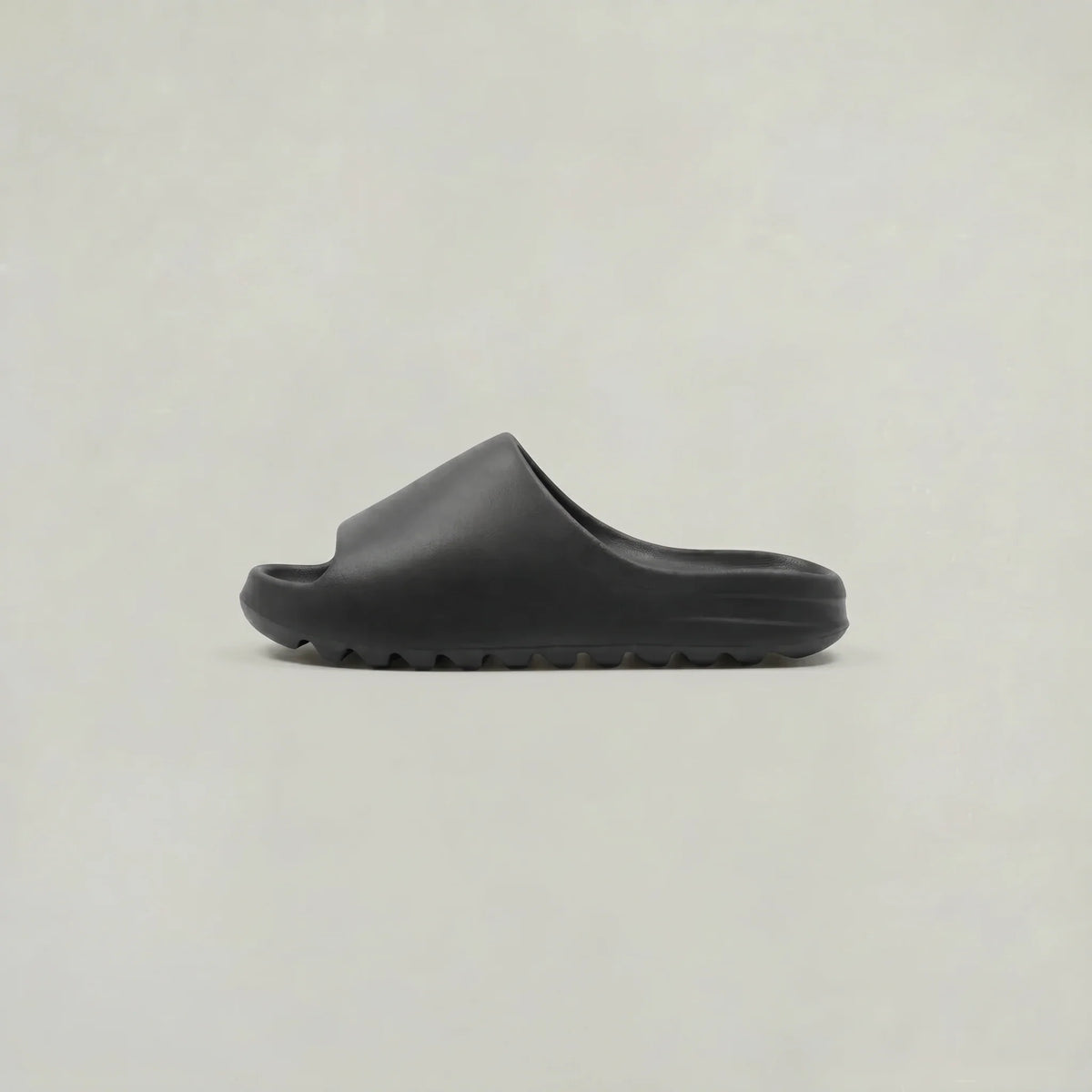 Men's black open toe slide sandals with molded footbed