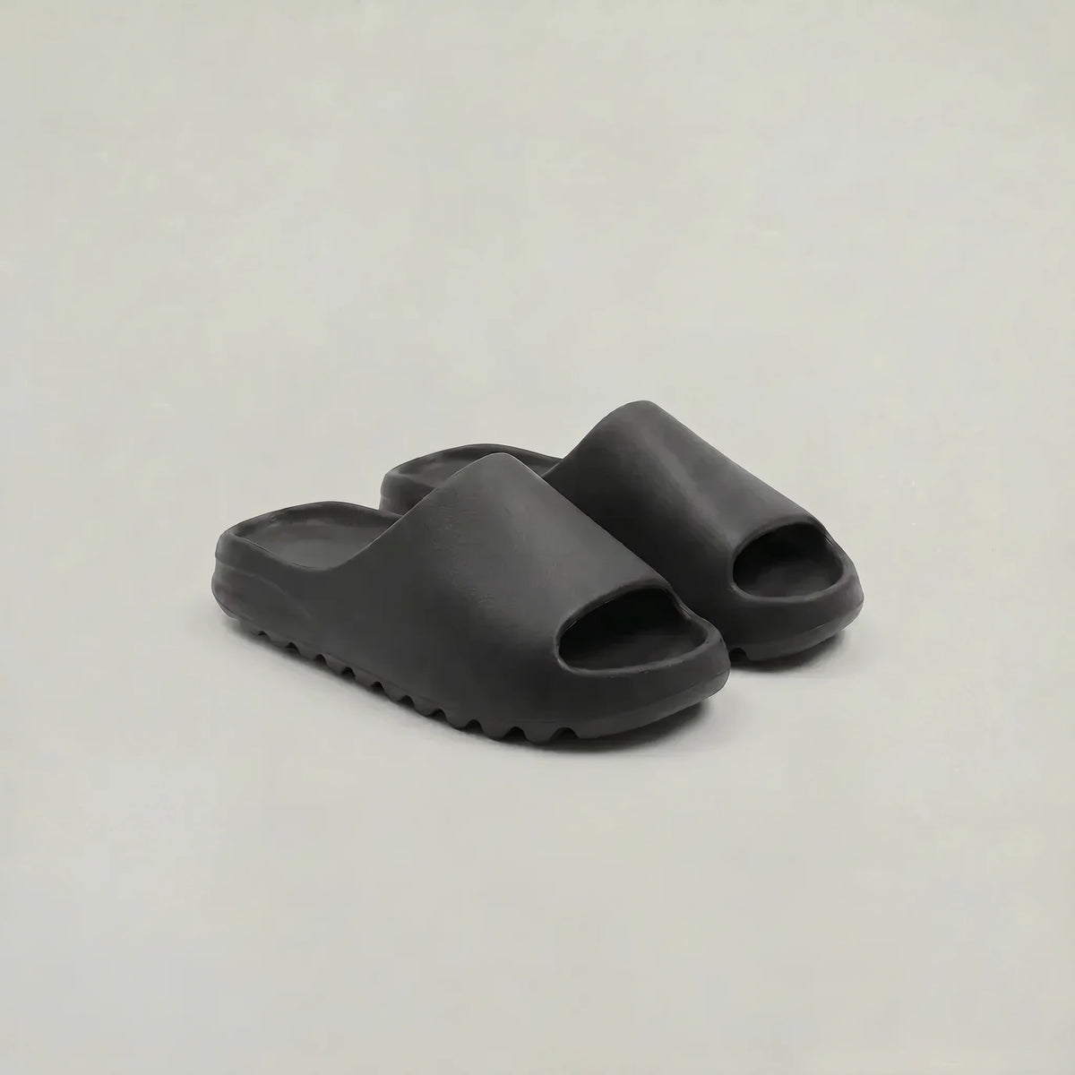 Men's green slide sandals with textured tread sole