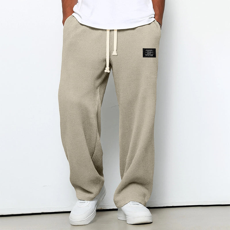 Men's beige waffle knit jogger pants with elastic drawstring waist
