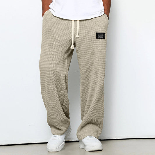 Men's beige waffle knit jogger pants with elastic drawstring waist