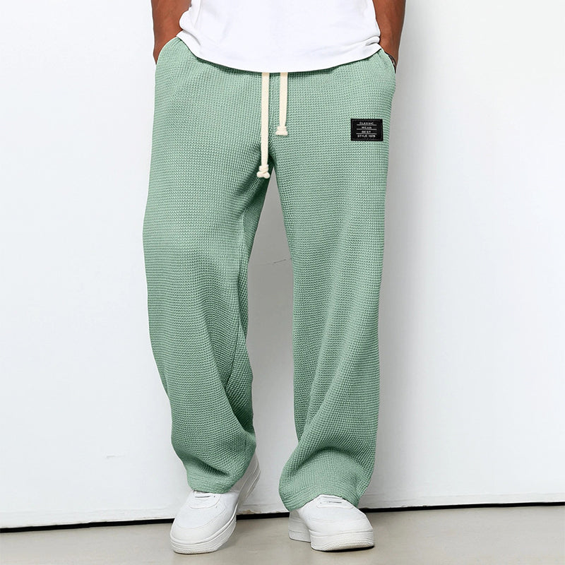 Men's beige waffle knit jogger pants with elastic drawstring waist