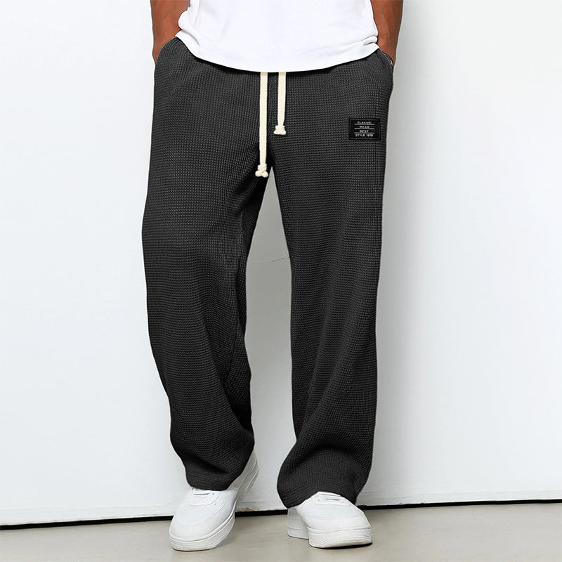 Men's beige waffle knit jogger pants with elastic drawstring waist