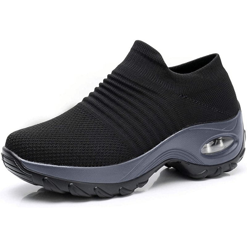 Women's black slip-on walking sneakers with grey air cushion sole
