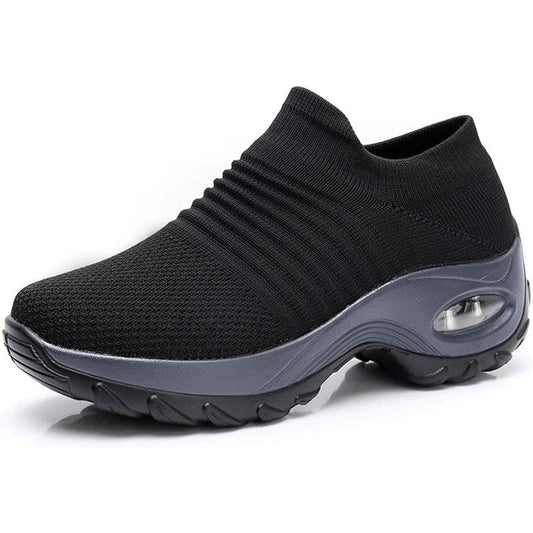 Women's black slip-on walking sneakers with grey air cushion sole