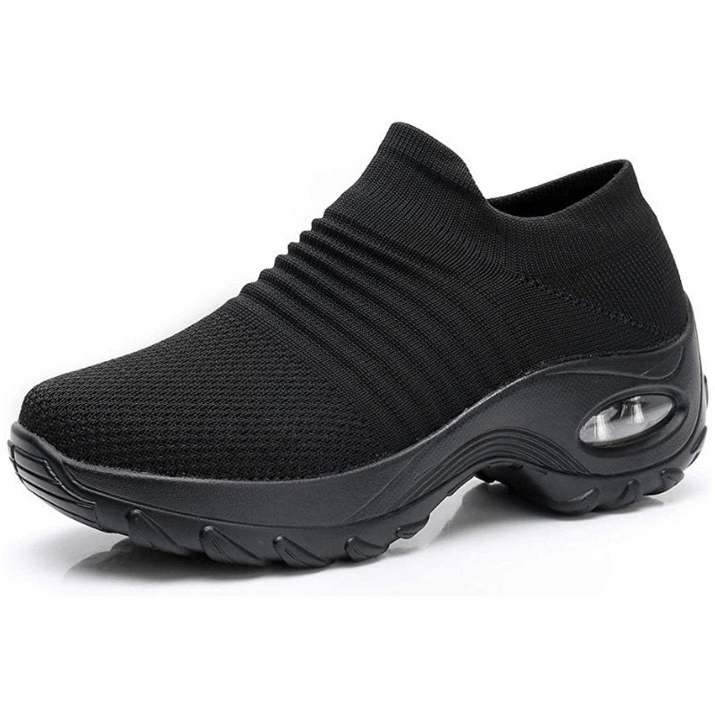Women's black slip-on walking sneakers with grey air cushion sole