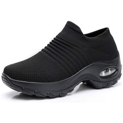 Women's black slip-on walking sneakers with grey air cushion sole
