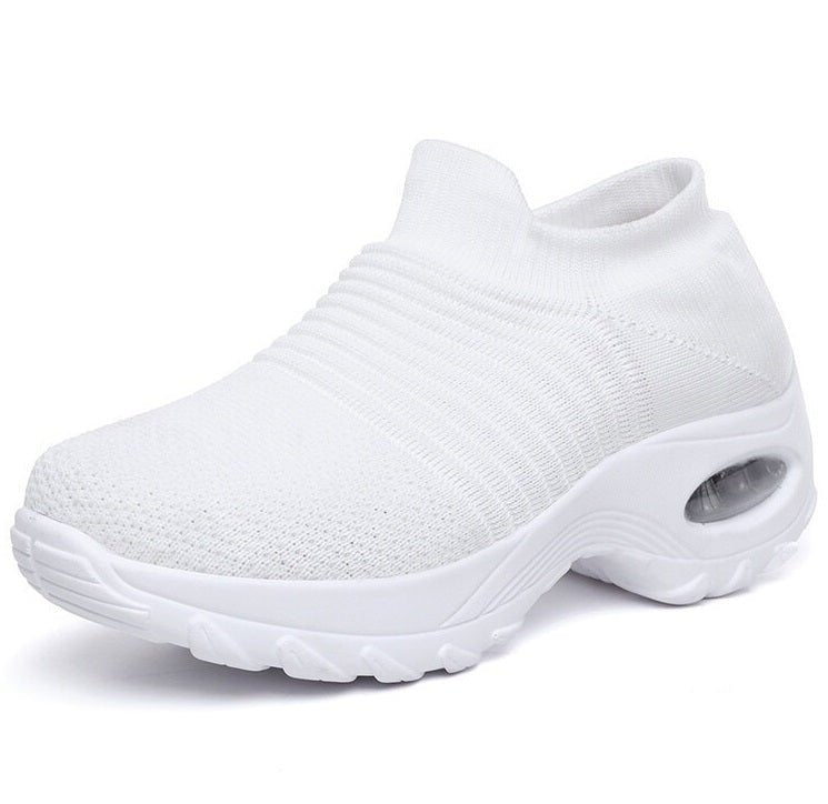 Women's black slip-on walking sneakers with grey air cushion sole