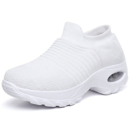 Women's black slip-on walking sneakers with grey air cushion sole