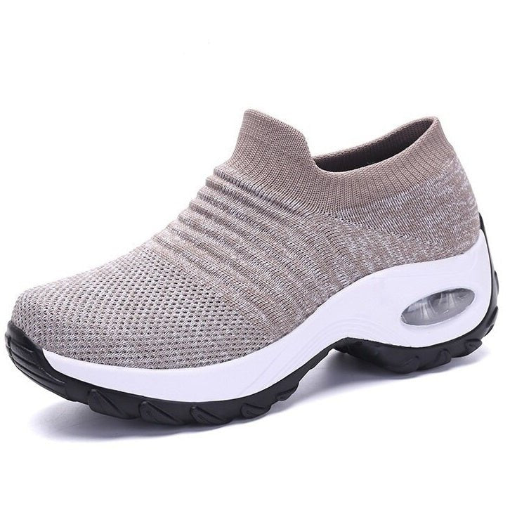 Women's black slip-on walking sneakers with grey air cushion sole