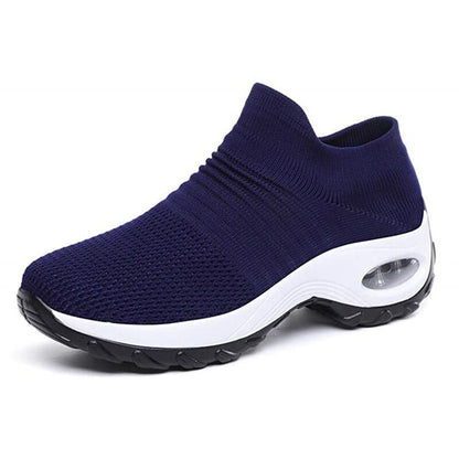 Women's black slip-on walking sneakers with grey air cushion sole