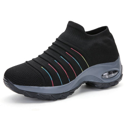 Women's black slip-on walking sneakers with grey air cushion sole