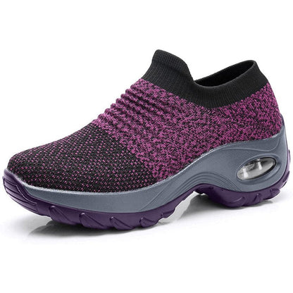 Women's black slip-on walking sneakers with grey air cushion sole