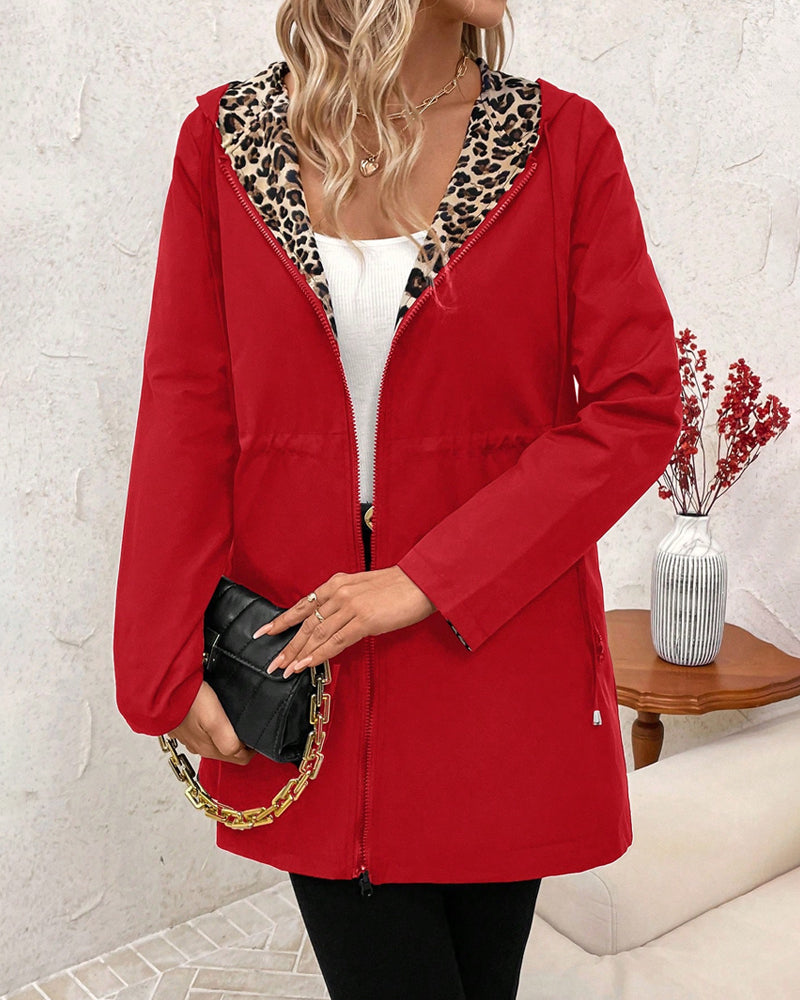 Women's reversible leopard lined hooded jacket in black polka dot