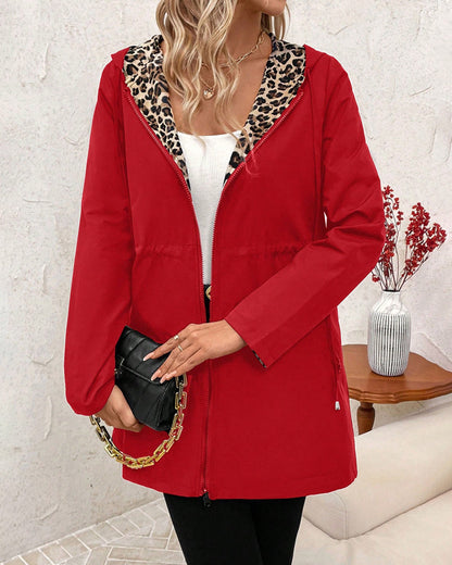 Women's reversible leopard lined hooded jacket in black polka dot