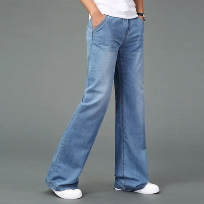 Men's light blue bootcut flare jeans in premium denim with reinforced stitching