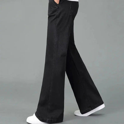 Men's light blue bootcut flare jeans in premium denim with reinforced stitching