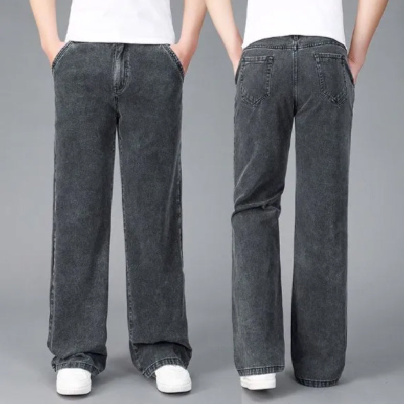 Men's light blue bootcut flare jeans in premium denim with reinforced stitching