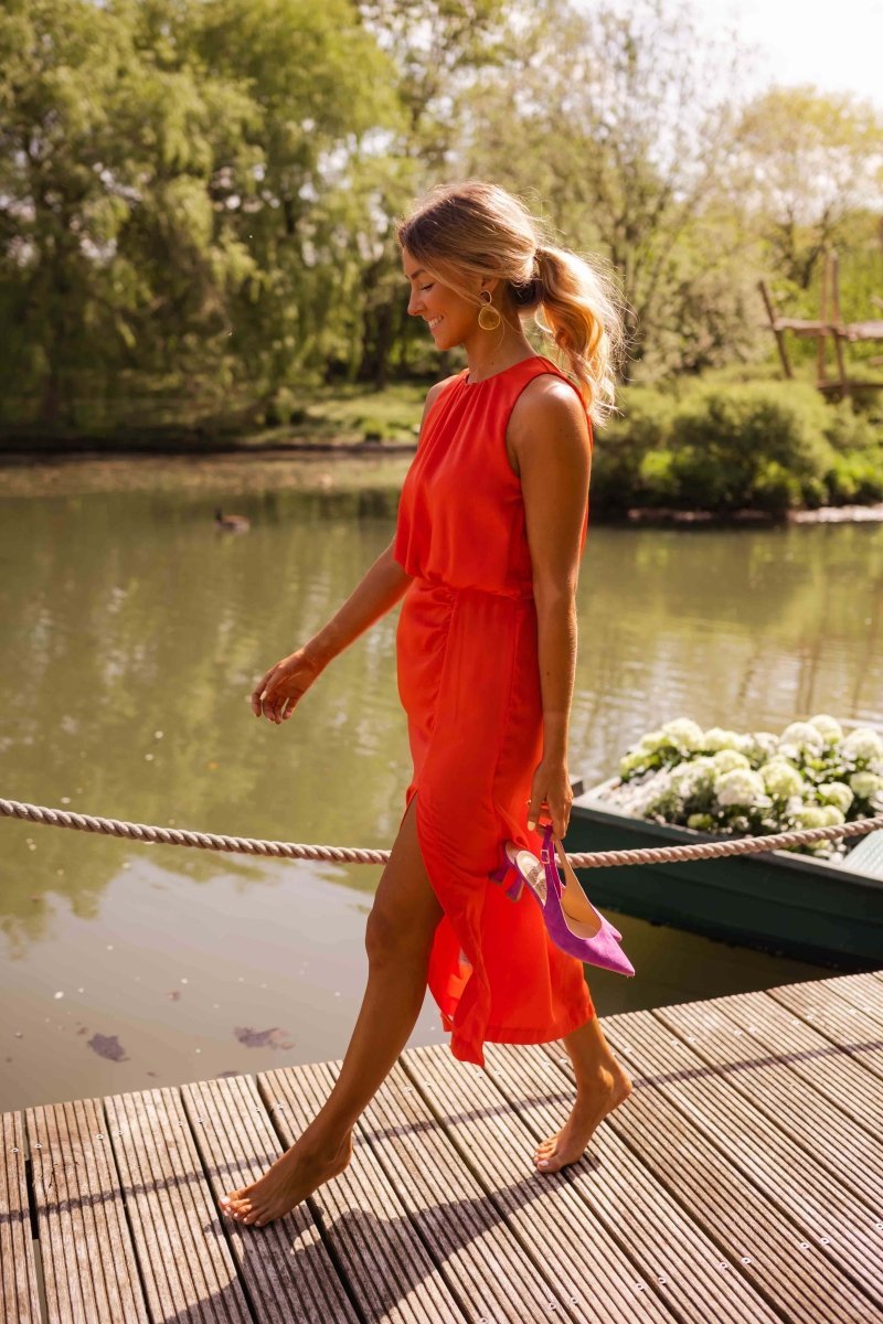 Women's orange sleeveless crew neck midi dress with side slit