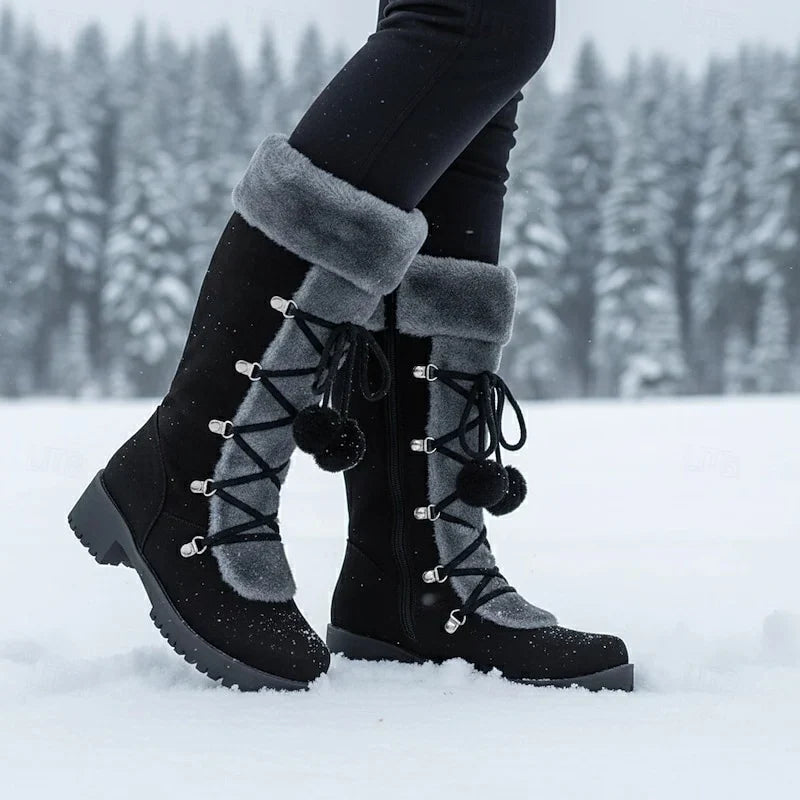 Women's black lace-up snow boots with fur trim