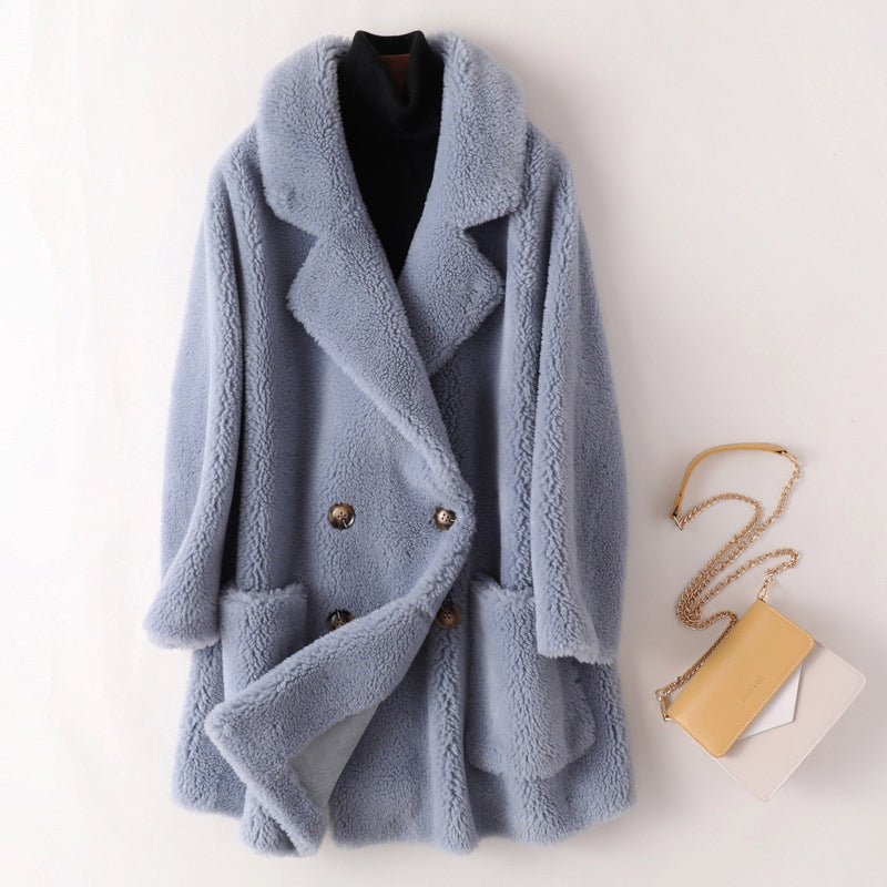 Women's pink oversized faux shearling coat with double breasted front