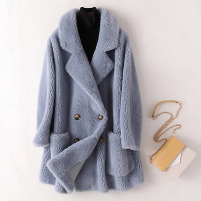 Women's pink oversized faux shearling coat with double breasted front