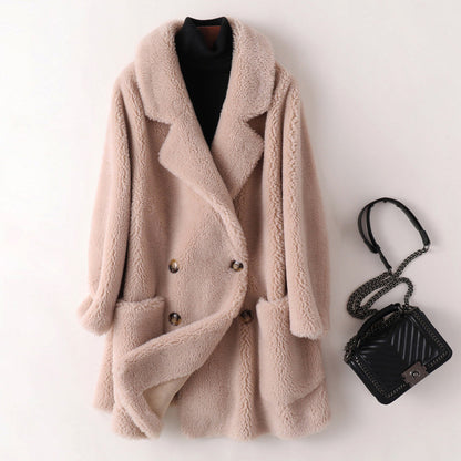 Women's pink oversized faux shearling coat with double breasted front