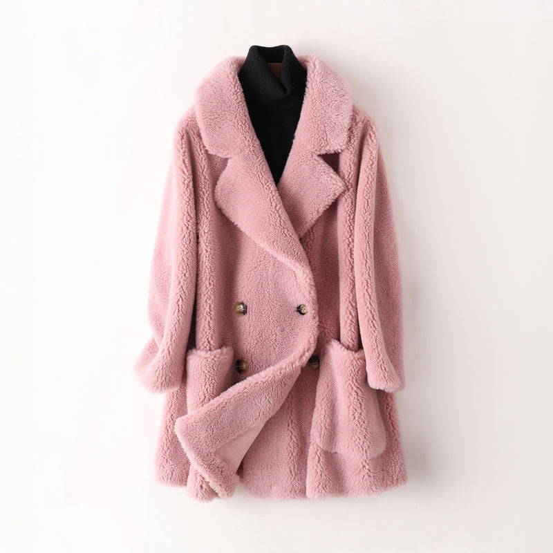Women's pink oversized faux shearling coat with double breasted front