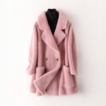 Women's pink oversized faux shearling coat with double breasted front