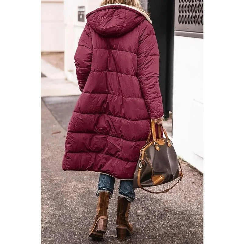 Women's black longline quilted puffer jacket with sherpa lining