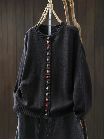 Women's black lightweight knit cardigan with button details