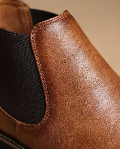 Men's brown leather boots, side profile