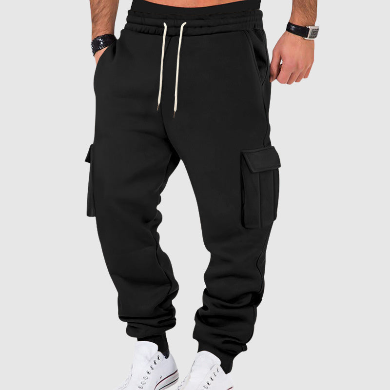 Men's black plush fleece utility cargo pants with tapered leg