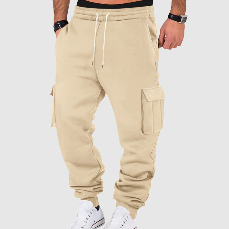 Men's black plush fleece utility cargo pants with tapered leg