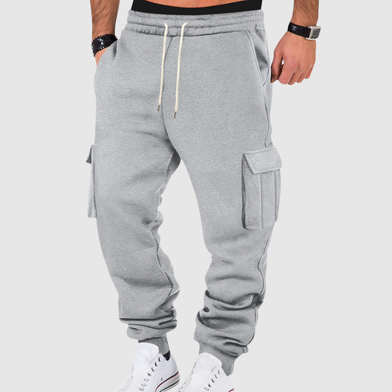 Men's black plush fleece utility cargo pants with tapered leg