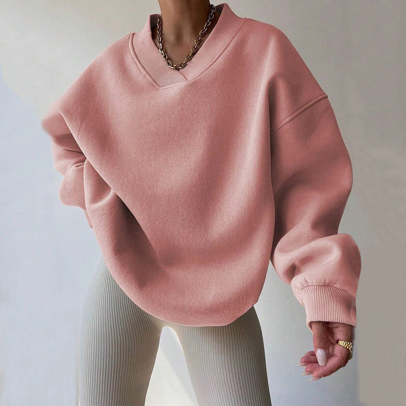 Women's light pink oversized v neck sweatshirt with ribbed cuffs