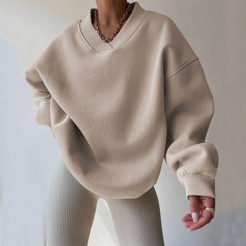 Women's light pink oversized v neck sweatshirt with ribbed cuffs