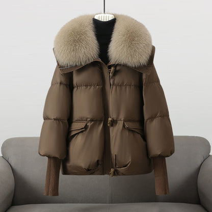Women's black longline puffer jacket with faux fur collar