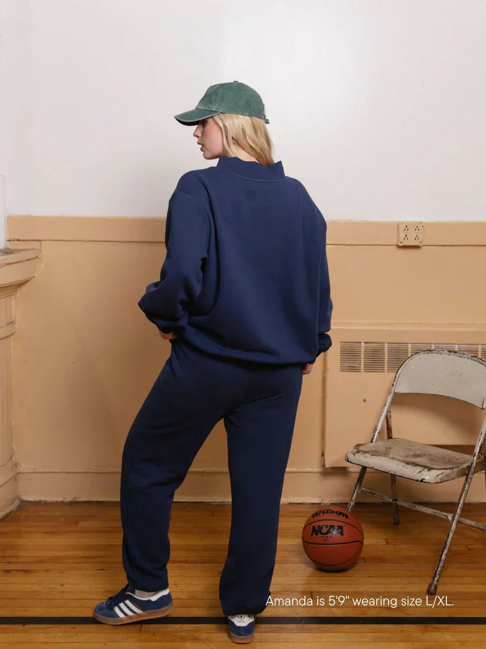 Navy mock neck varsity sweatshirt with white chenille lettering