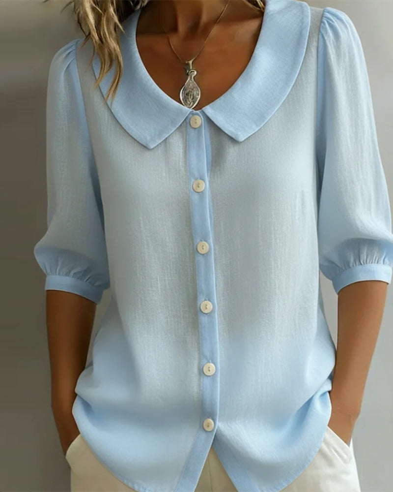 Women's blue Peter Pan collar blouse with 3/4 sleeves