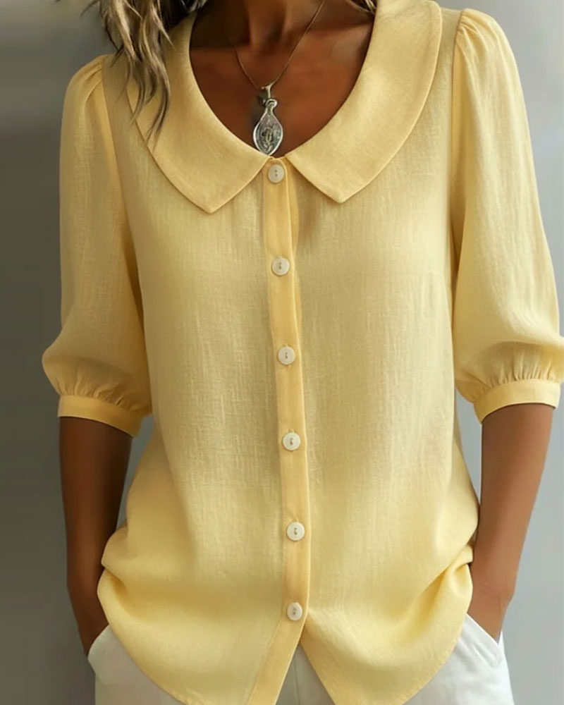 Women's blue Peter Pan collar blouse with 3/4 sleeves
